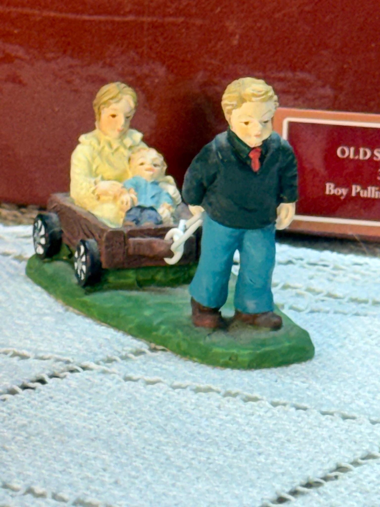 Lang & Wise Folk Art Villages of Old Stonington Man Pulling Cart with Baby Figurine