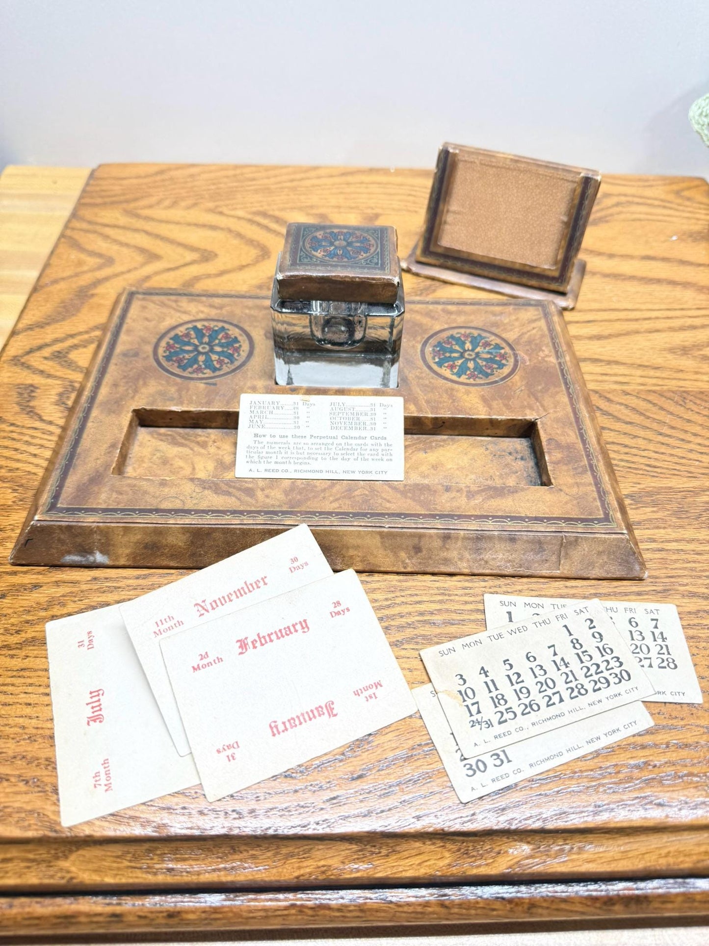 A. L. Reed Perpetual Calendar, Ink Well, and Pen Rest Desk Set
