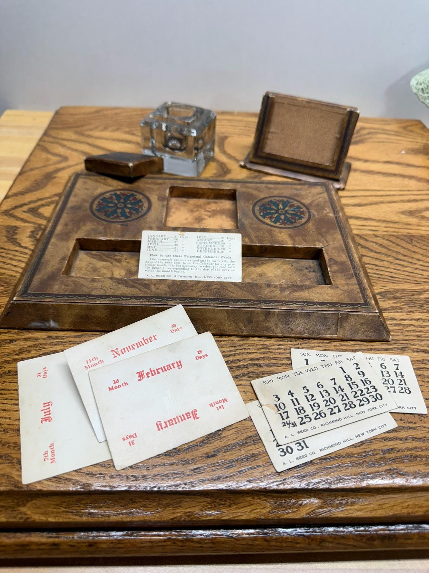 A. L. Reed Perpetual Calendar, Ink Well, and Pen Rest Desk Set