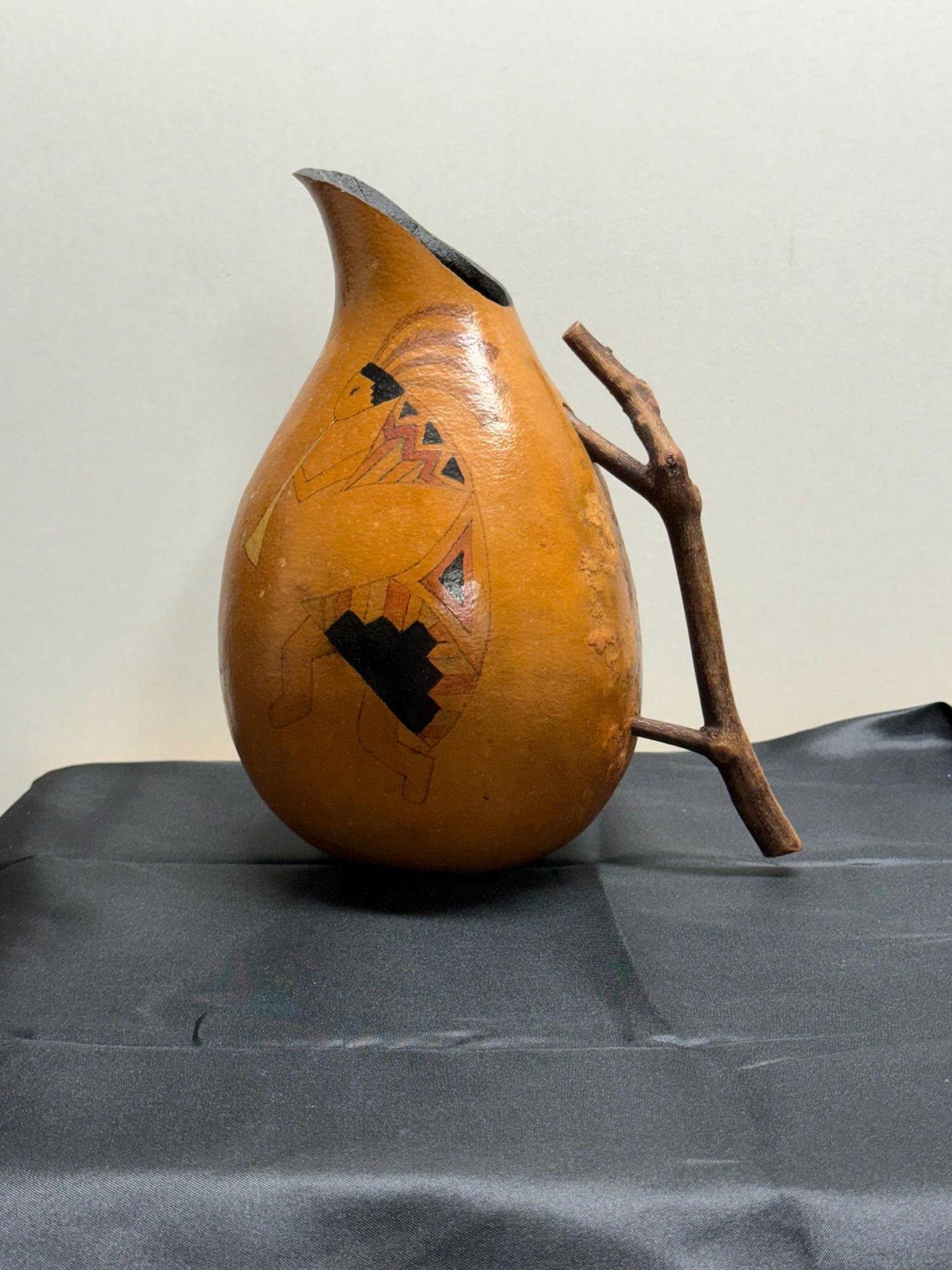 Hand-Painted Gourd Jug featuring a Southwest-Style Musician