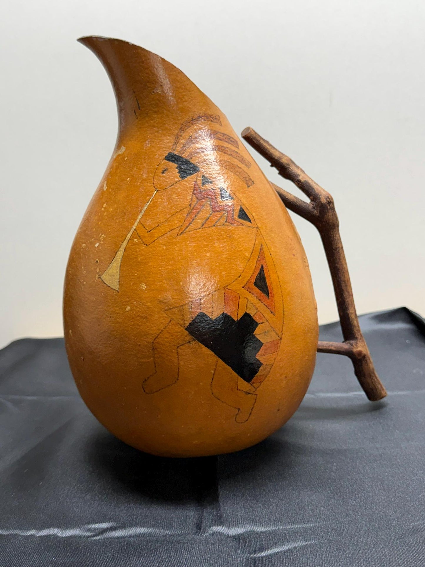 Hand-Painted Gourd Jug featuring a Southwest-Style Musician